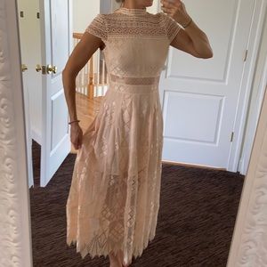 Gorgeous dress. Never worn. Bought it for a special occasion but didn’t make it.